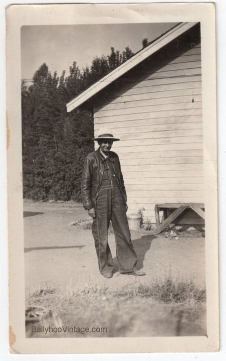 Farmer in Overalls and Leather Jacket